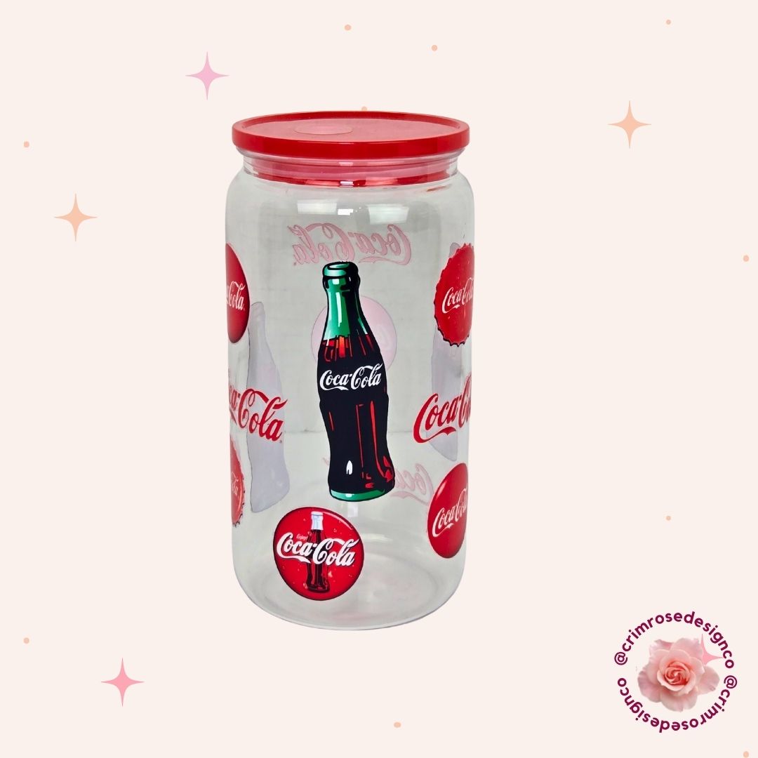 16oz acrylic cup with a coca cola design topped with a red lid